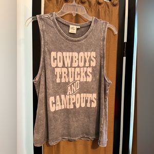 Never worn sleeveless tee shirt